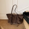 Retro deep brown leather tote bag with stylish metallic eyelets on shoulder straps - Brown