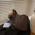 Deep brown vintage leather underarm bag with a cute teddy bear charm on black fabric - Coffee (With Pendant)