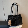 Large black shoulder tote bag with white contrast stitching and brown plush bear charm - With Charm / Black