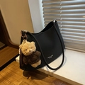 Minimalist black crescent underarm bag in matte leather with a cute plush bear charm - Black (With Charm)