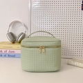 Light green embossed leather vanity bag with reinforced top handle and gold double zippers - Green