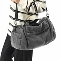 Washed grey denim crossbody travel bag with adjustable strap and large capacity - Gray