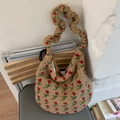 Detail of floral sherpa hobo bag featuring red flower prints and ruffled strap texture - Small Red Flowers