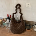 Detail of fuzzy brown tote with white polka dots, wavy handle and metal chain strap - Brown Polka Dot