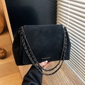 Classic black leather chain shoulder bag with matte finish and brand logo detail - Black