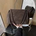 Brown suede shoulder bag with dark grey metal chain strap and flap closure - Brown