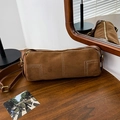 Brown suede cylinder bag with white contrast stitching and wide leather shoulder strap - Brown Solid
