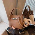 Brown litchi leather bucket bag with silver metal lock and cute rabbit charm - With Pendant / Brown