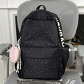 Black canvas backpack with starry print, side JOYBAG logo and pink donut charm - With Charm / Black