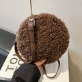 Dark brown lamb wool round crossbody bag with adjustable leather strap and fluffy texture - Brown