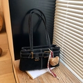 Black underarm tote bag with white contrast stitching and cute plush bear charm - With Charm / Black