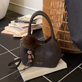 Dark brown leather bucket bag with decorative fur pompom and wooden bead charm - Coffee with Pendant