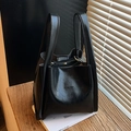 Glänzende schwarze Beuteltasche mit großem Fassungsvermögen und elegantem Tragegriff - Schwarz