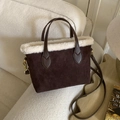 Dark brown suede bucket bag with cream faux fur trim and monogrammed adjustable strap - Brown