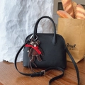 Minimalist black litchi leather shell bag with bear charm and adjustable strap - With Pendant / Black