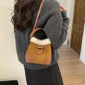 Brown suede mini bucket bag with white faux fur trim and gold twist lock closure - Caramel color