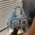 Retro washed denim square crossbody bag in blue with double handles and brown logo - Light Blue