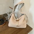 Beige faux shearling crossbody bag featuring leopard print strap and horn button closure - White