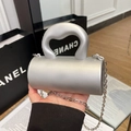Mini silver acrylic cylindrical handbag with round handle and detachable chain strap - Silver