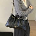 Chic black quilted leather tote bag with gold chain strap and elegant diamond stitching - Black