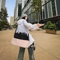 Black and pink large capacity travel tote bag with adjustable shoulder strap and side pocket - Pink