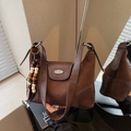 Vintage brown suede and leather dumpling bag with decorative beads and metal label - With Wood Pendant Style / Coffee