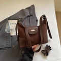 Dark brown suede dumpling bag with leather trim and additional adjustable shoulder strap - No Charm Style / Coffee