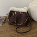 Dark brown matte bucket bag with white faux fur trim and gold chain shoulder strap - Brown