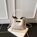 Beige bucket bag in litchi grain leather with gold twist lock and shoulder strap - No Pendant / Beige Grey