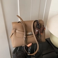 Brown lychee leather shoulder bag with silver clasp and dachshund pendant detail - With Charm / Elephant Gray