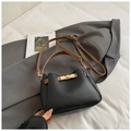 Small black lychee texture bucket bag with brown strap and golden metal twist lock - No Pendant / Classic Black