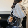 Classic black leather hobo shoulder bag for women with a cute plush bear charm accessory - With Charm / Black