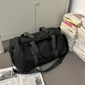 Große schwarze Reisetasche mit Schultergurt und seitlichem Netzfach für Sport und Fitness - Schwarz