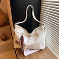 White faux leather tote bag with unique criss-cross straps and plush bear charm - With Pendant / White