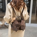 Versatile dark brown faux suede multi-purpose backpack with dual front flap pockets - Dark Brown (With Charm)