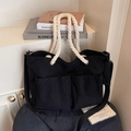 Sac cabas noir en velours côtelé avec deux poches avant et poignées en corde crème - Noir