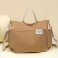 Borsa tote in nylon kaki con tasche multiple, manici e tracolla regolabile rimovibile - Cuoio
