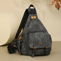 Macro detail of retro gray soft leather bag with golden metal twist lock and buckle - Black