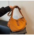 Detail of caramel canvas shoulder bag with textured fabric and adjustable wide strap - Brown
