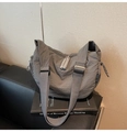 Detail of grey textured fabric on casual crossbody bag with double zipper and strap - Gray