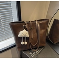 Close-up of brown textured tote bag with white stitching and plush cloud charm - With Pendant / Coffee