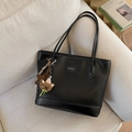 Black vintage leather tote bag with long straps and a cute brown bear charm - Black with Pendant
