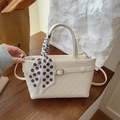 Cream woven crossbody bag with brown polka dot scarf and leather top handle decoration - Off-white