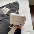 Elegant white square crossbody bag with gold hardware and top handle for women - Off-white