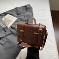 Minimalist dark brown leather square bag with gold buckle and adjustable strap - Coffee