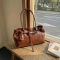 Retro brown leather tote bag with dual shoulder straps and metallic buckle detail - Brown