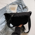 Minimalist black canvas chest bag with adjustable shoulder strap and large capacity - Black