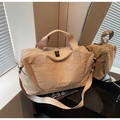 Large beige travel bag with adjustable strap and side pockets for sports and short trips - Khaki