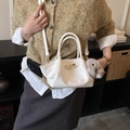 White pleated dumpling bag with gold twist lock and a cute plush bunny charm - With Charm / White