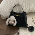 Retro black bucket handbag with gold hardware and a cute plush bunny pendant accessory - Suede Black With Charm